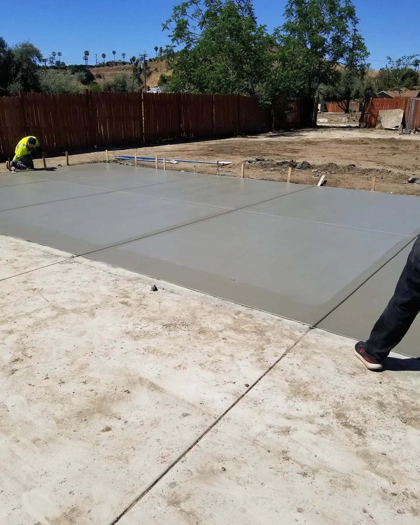 Concrete patio extension poured and finished by Mountain Ridge Renovations