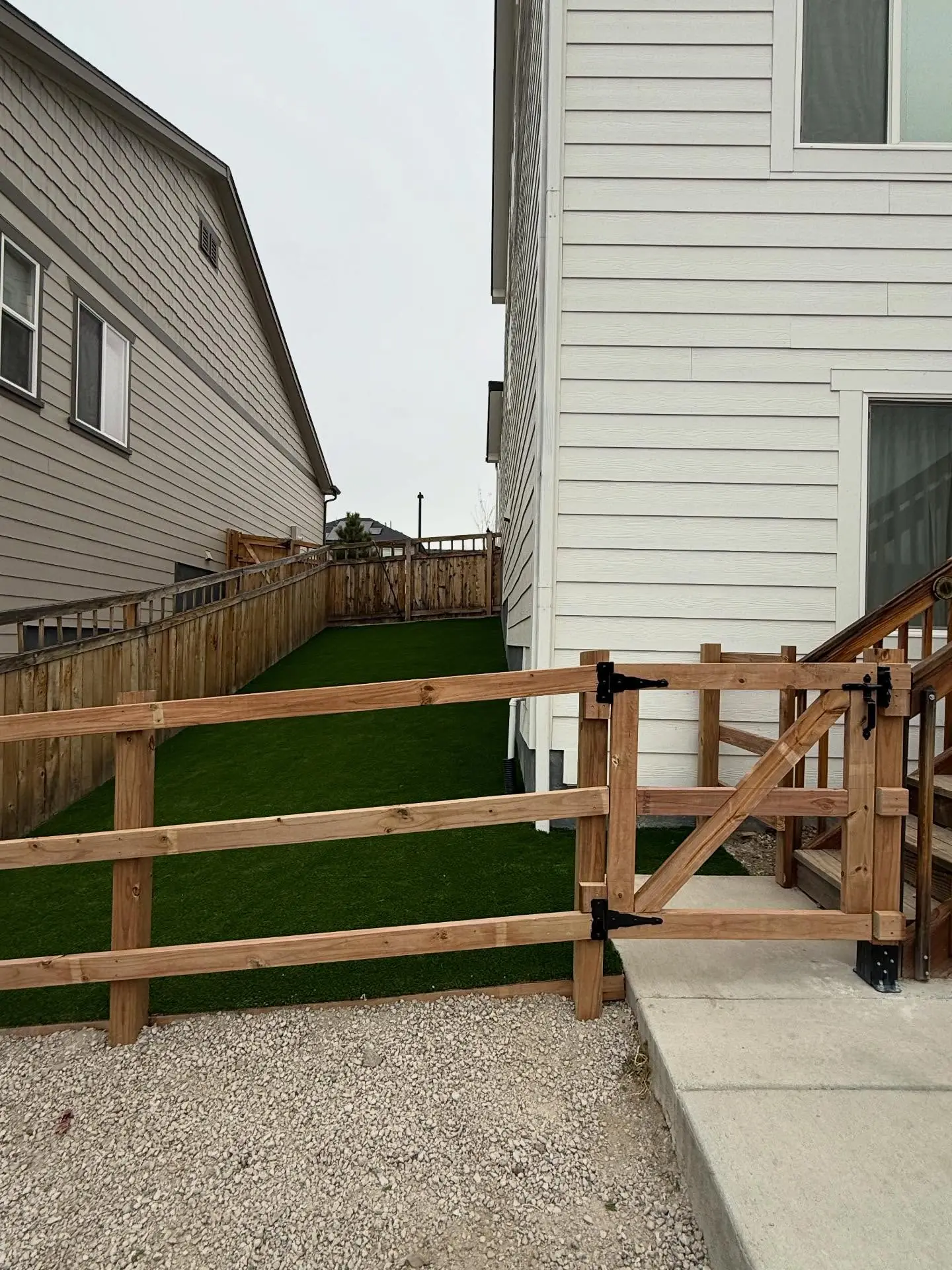 Artificial turf dog run and fence build by Mountain Ridge Renovations
