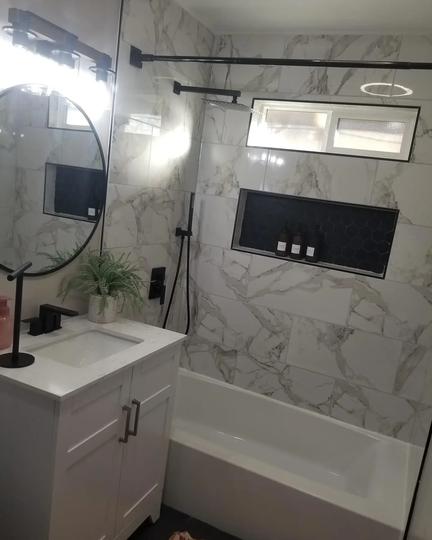 Finished full bathroom remodel with new tile by Mountain Ridge Renovations in the Parker area