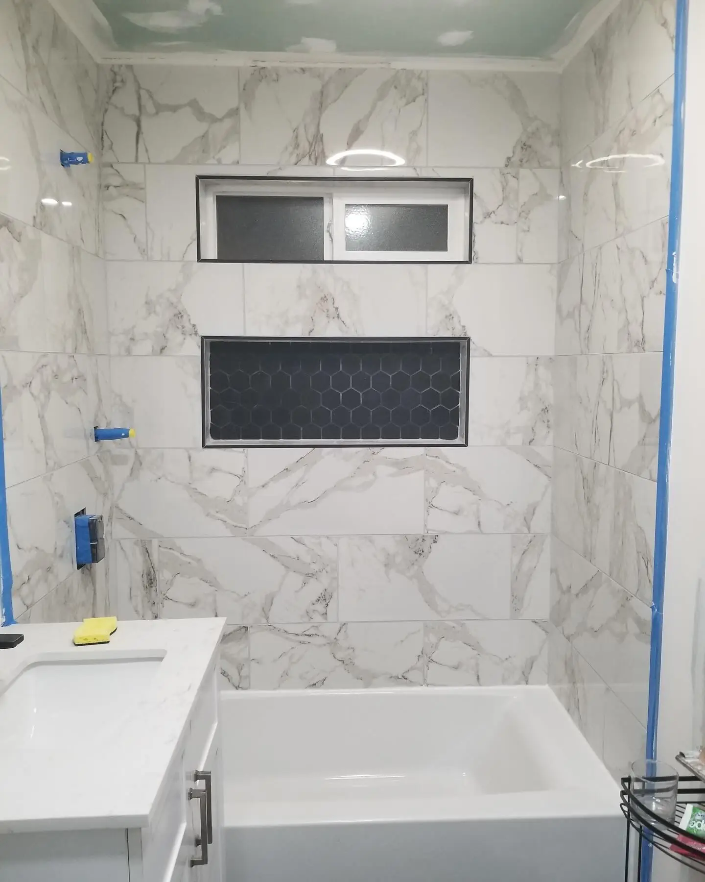 Finished bathroom vanity and fixtures by Mountain Ridge Renovations
