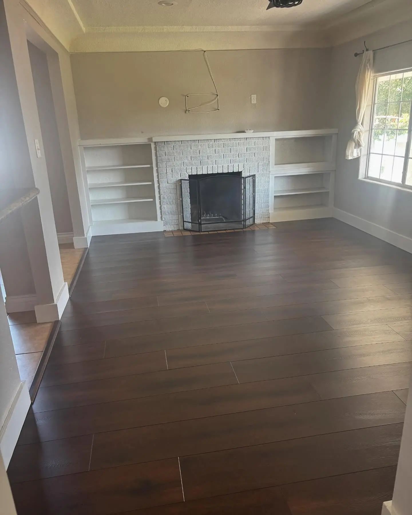 Laminate Wood floor install – tile installation by Mountain Ridge Renovations in Denver, Colorado